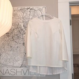 White Lululemon top with ruffle detail